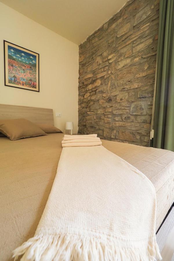 Rivacanze Apartments Laglio Bagian luar foto
