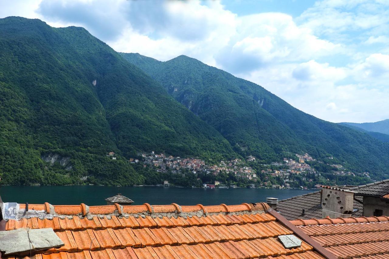 Rivacanze Apartments Laglio Bagian luar foto