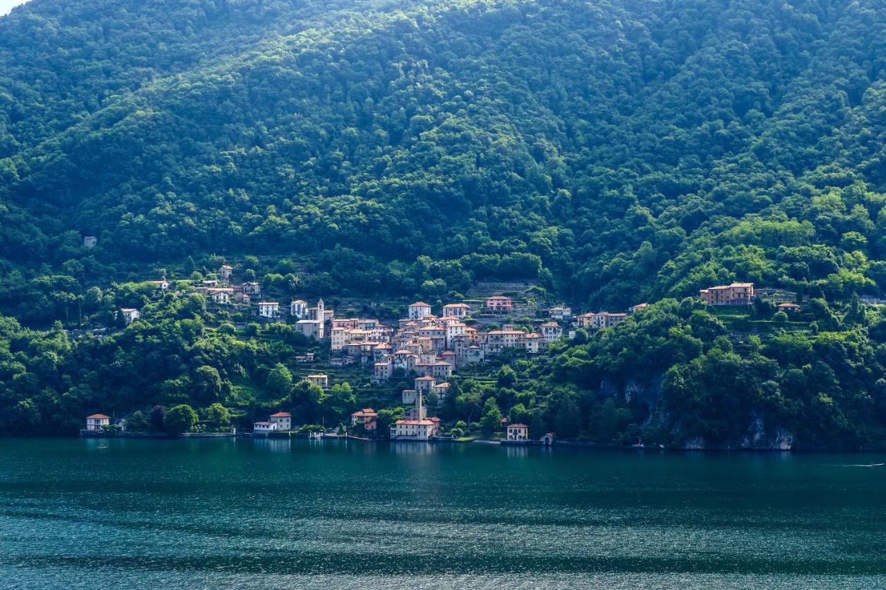 Rivacanze Apartments Laglio Bagian luar foto